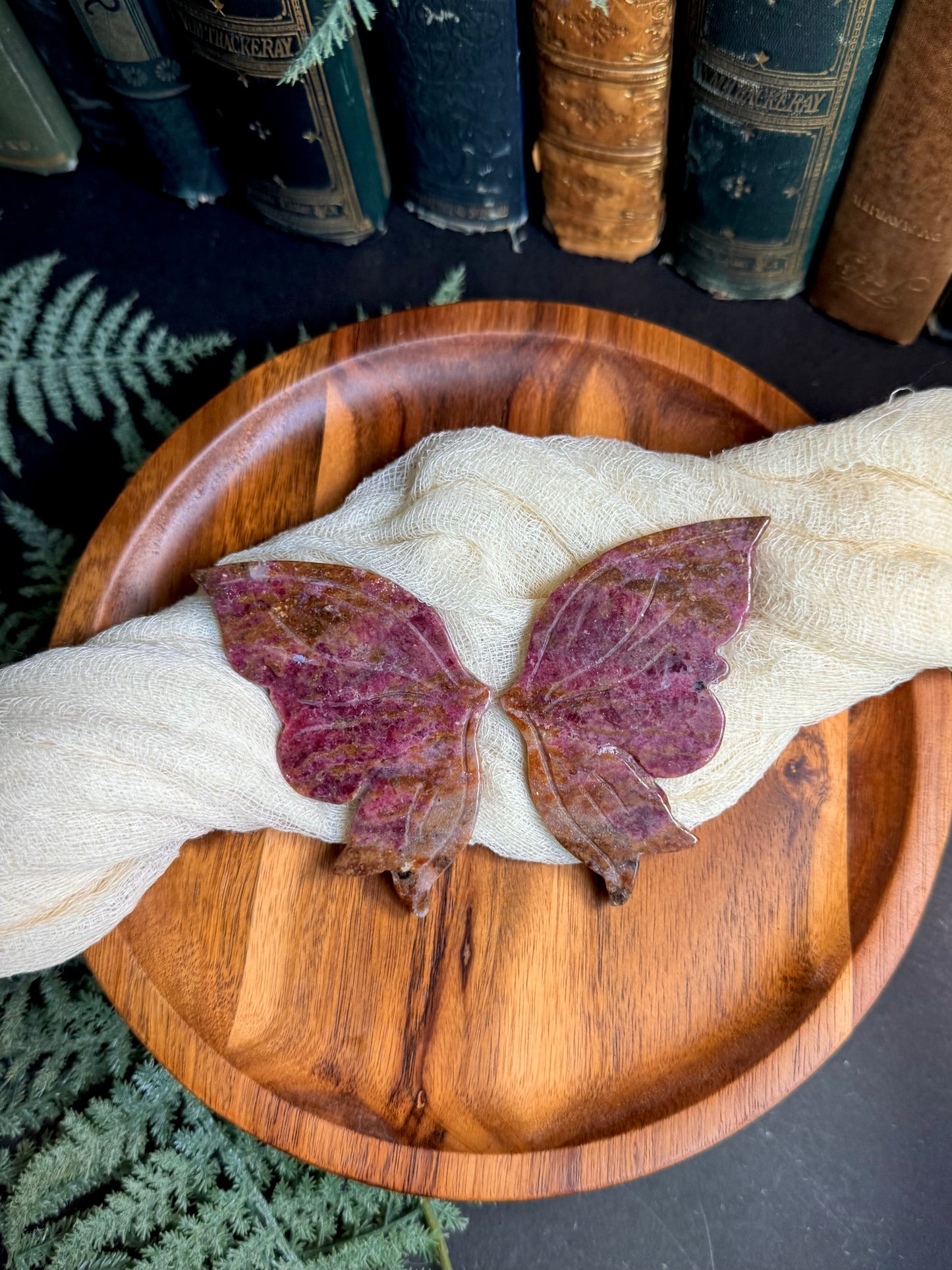 Icy Rhodonite With Golden Healer Butterfky Wings on Gold Stand